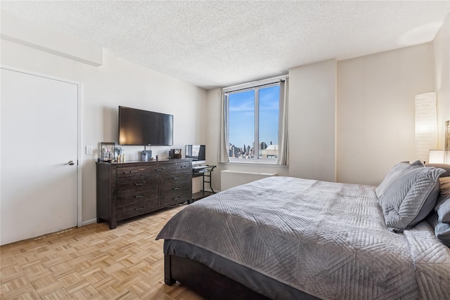 4-74 48th Ave Unit Ph4D, Long Island City, NY 11109 - bedroom with a textured ceiling
