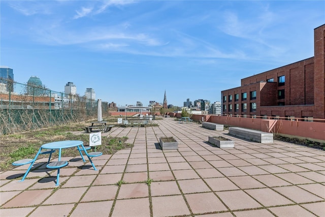 4-74 48th Ave Unit Ph4D, Long Island City, NY 11109 - view of patio featuring a skyline view