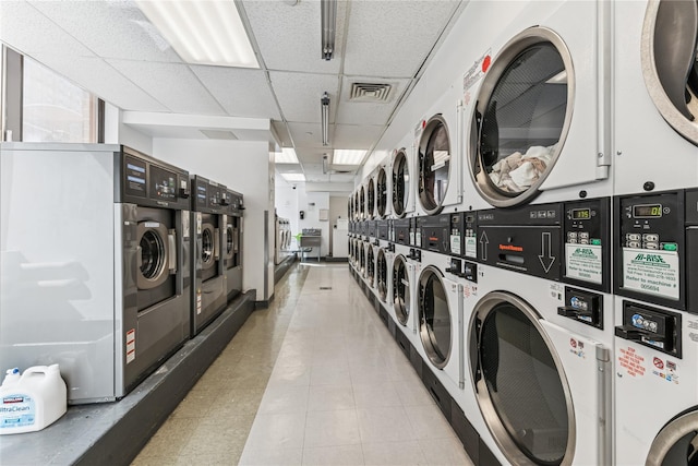 4-74 48th Ave Unit Ph4D, Long Island City, NY 11109 - community laundry room featuring stacked washer / drying machine, washing machine and dryer, and mail area
