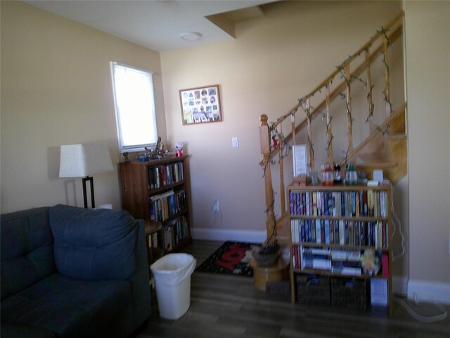 living room with wood finished floors and baseboards