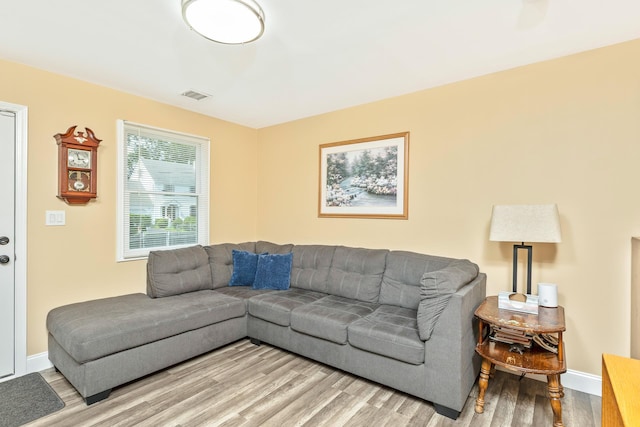 2 Lafayette Dr, Shirley, NY 11967 - living area with light wood-type flooring and baseboards