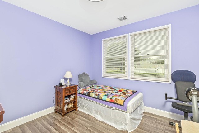 2 Lafayette Dr, Shirley, NY 11967 - bedroom with baseboards and wood finished floors