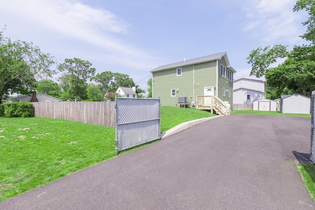 2 Lafayette Dr, Shirley, NY 11967 - view of home's exterior featuring a shed