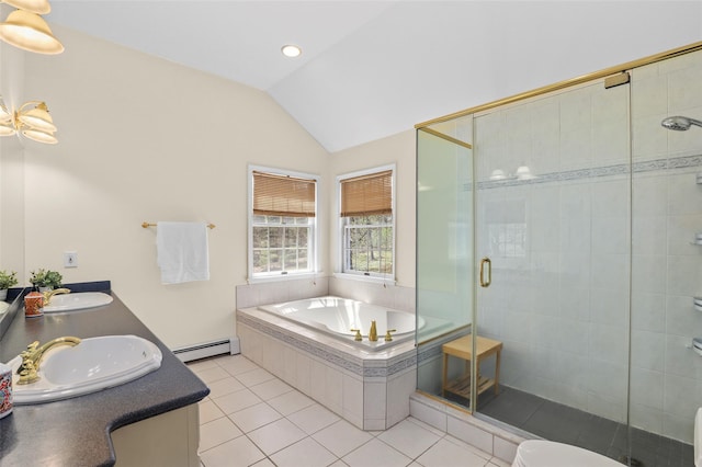bathroom with a baseboard heating unit, a bath, a sink, vaulted ceiling, and tile patterned flooring