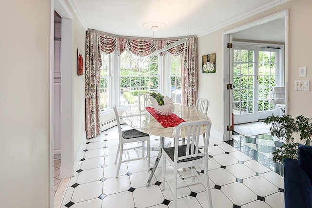 45 Holiday Blvd, Center Moriches, NY 11934 - dining space featuring ornamental molding, baseboards, and a baseboard radiator