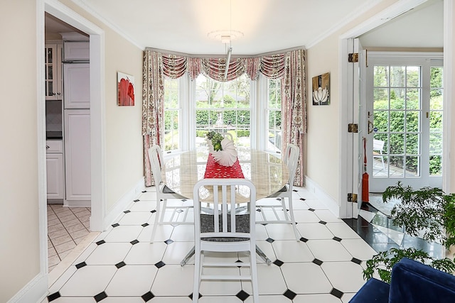 45 Holiday Blvd, Center Moriches, NY 11934 - dining room featuring plenty of natural light, baseboards, and ornamental molding