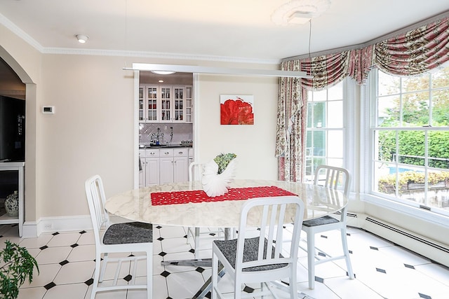 45 Holiday Blvd, Center Moriches, NY 11934 - dining space featuring arched walkways, ornamental molding, baseboards, and a baseboard heating unit