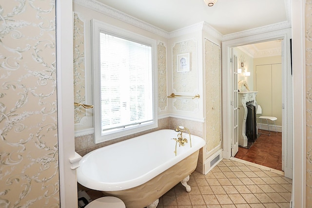 45 Holiday Blvd, Center Moriches, NY 11934 - bathroom featuring a freestanding bath and ornamental molding