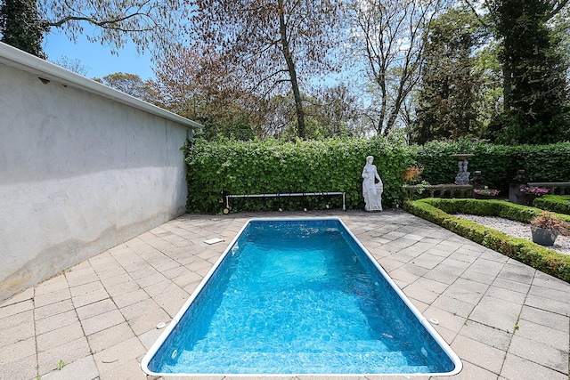 45 Holiday Blvd, Center Moriches, NY 11934 - view of pool featuring a patio