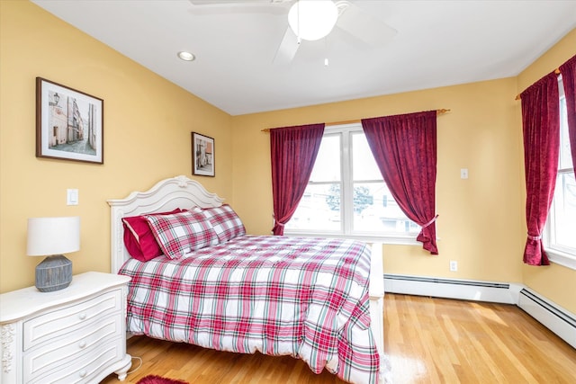 bedroom with wood finished floors, ceiling fan, and recessed lighting