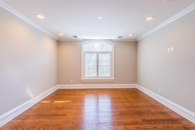11 Victorian Ln, Brookville, NY 11545 - empty room with wood finished floors, recessed lighting, and crown molding
