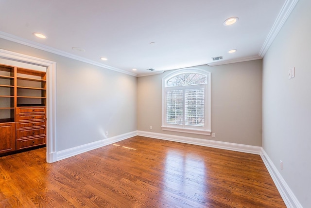 11 Victorian Ln, Brookville, NY 11545 - empty room featuring dark wood-style floors, recessed lighting, and crown molding
