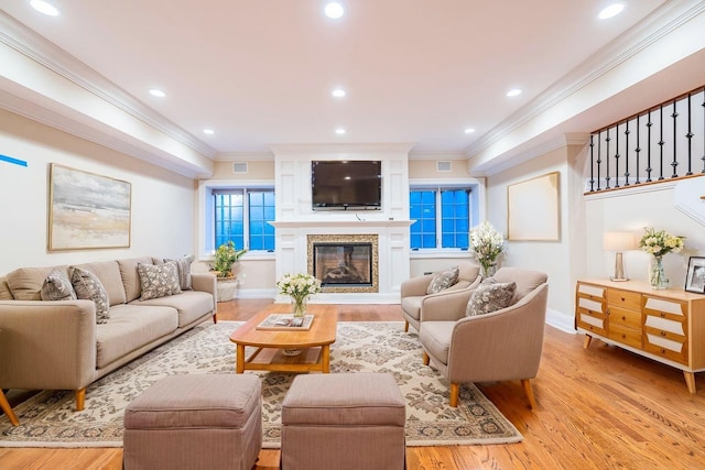 11 Victorian Ln, Brookville, NY 11545 - living room featuring light wood-style flooring, crown molding, a fireplace, and recessed lighting