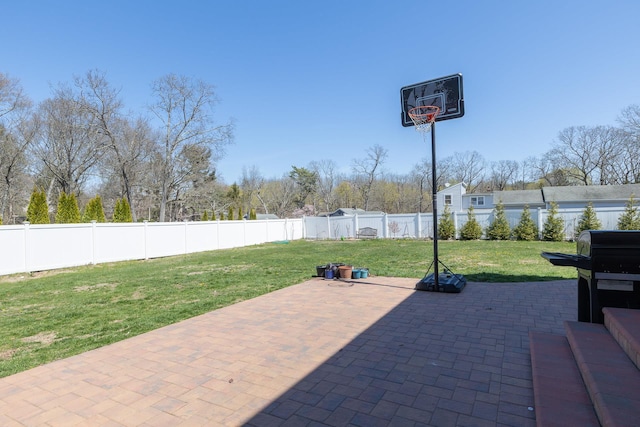 view of patio featuring grilling area and a fenced backyard