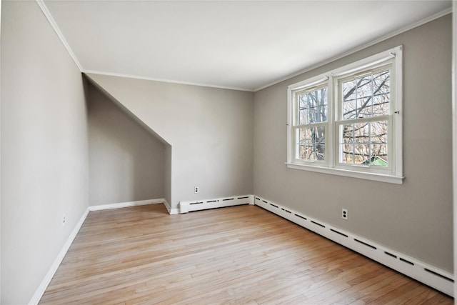 950 Main Bayview Rd, Southold, NY 11971 - interior space with crown molding, light wood finished floors, and baseboard heating