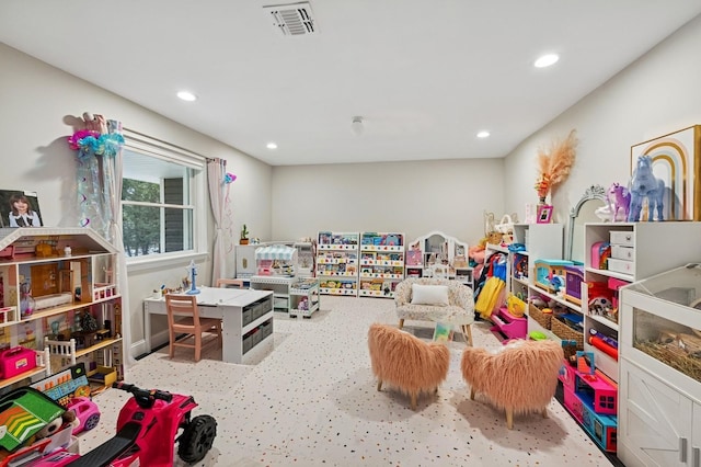 recreation room featuring visible vents and recessed lighting