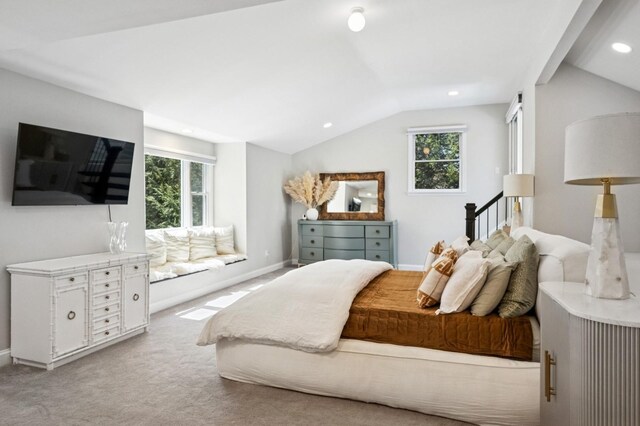 bedroom featuring lofted ceiling, multiple windows, carpet floors, and recessed lighting