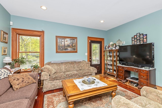 living room featuring recessed lighting and wood finished floors