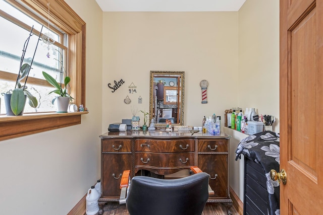 office with baseboards and dark wood-style floors
