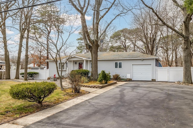 431 Grand Blvd, Brentwood, NY 11717 - ranch-style home with a garage, driveway, and fence