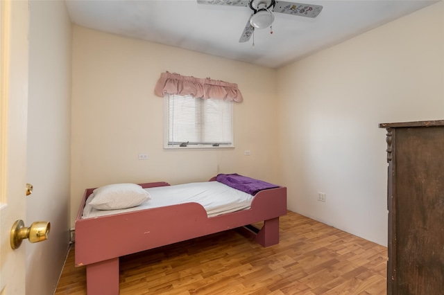431 Grand Blvd, Brentwood, NY 11717 - bedroom with wood finished floors and a ceiling fan