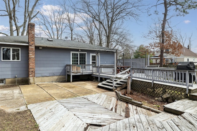431 Grand Blvd, Brentwood, NY 11717 - wooden deck featuring fence, grilling area, and a patio