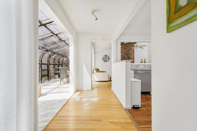 hall featuring wood finished floors