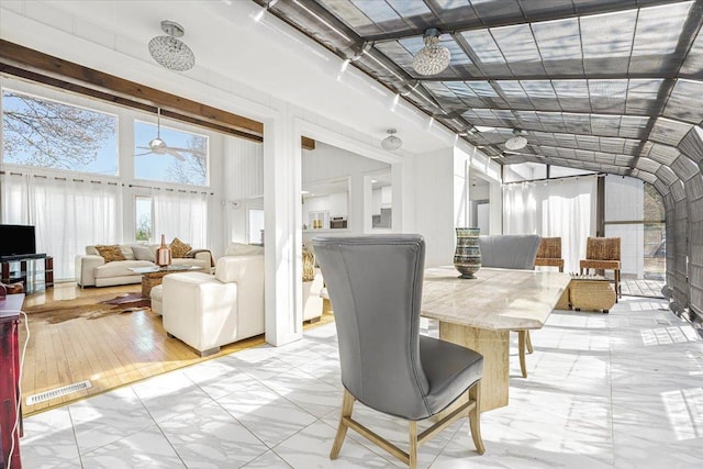 sunroom featuring visible vents