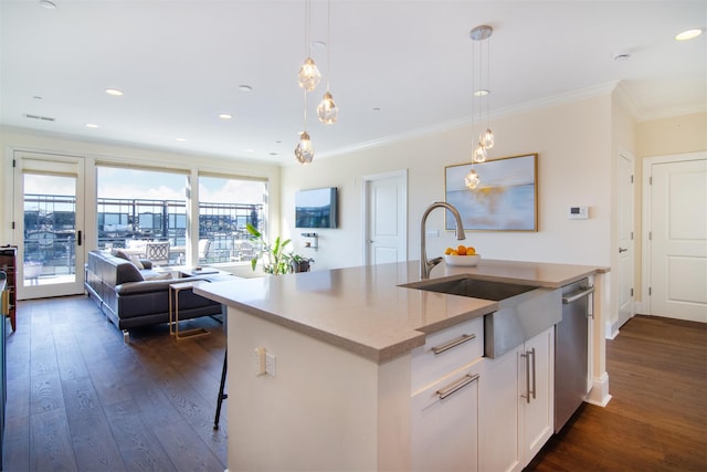18 Rivers Edge Dr Unit 506, Tarrytown, NY 10591 - kitchen with open floor plan, dishwasher, a sink, dark wood finished floors, and ornamental molding