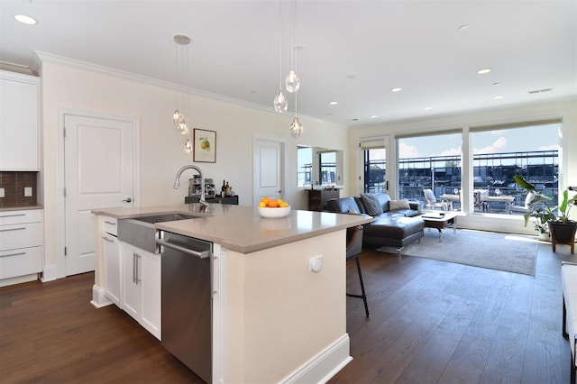 18 Rivers Edge Dr Unit 506, Tarrytown, NY 10591 - kitchen with a sink, stainless steel dishwasher, dark wood-type flooring, open floor plan, and crown molding