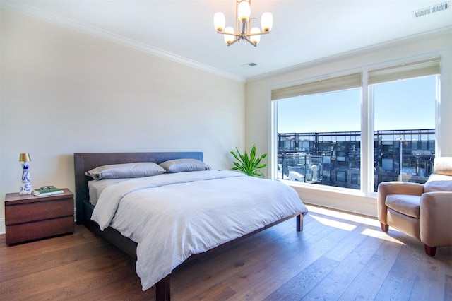 18 Rivers Edge Dr Unit 506, Tarrytown, NY 10591 - bedroom with a chandelier, wood finished floors, and ornamental molding