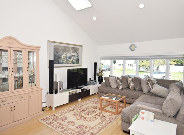 living area featuring high vaulted ceiling, light wood-type flooring, plenty of natural light, recessed lighting, and baseboard heating