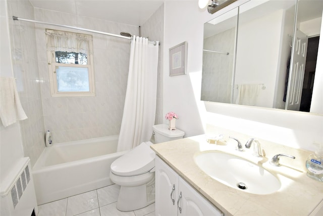 full bath featuring toilet, vanity, tile patterned flooring, and shower / bathtub combination with curtain