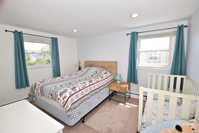 bedroom featuring recessed lighting and carpet flooring