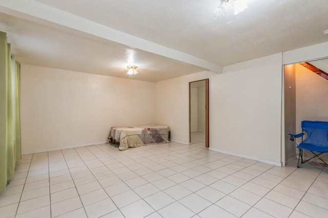 unfurnished bedroom featuring light tile patterned floors