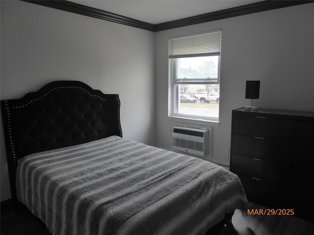 bedroom with a wall unit AC and crown molding