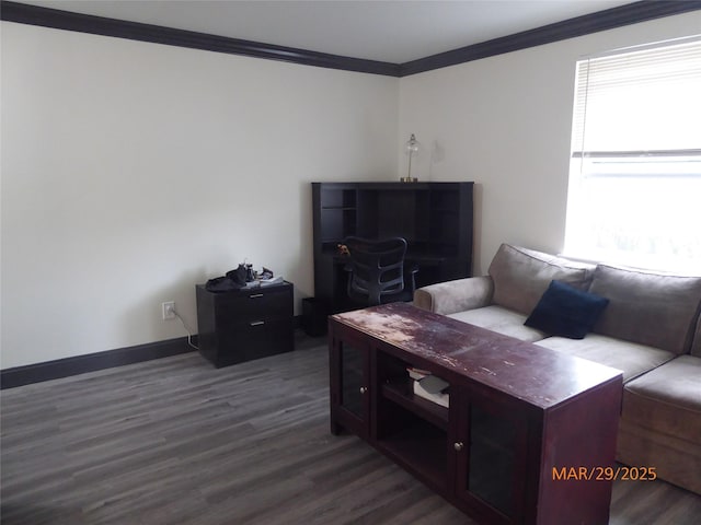 living room with dark wood-type flooring, ornamental molding, and baseboards