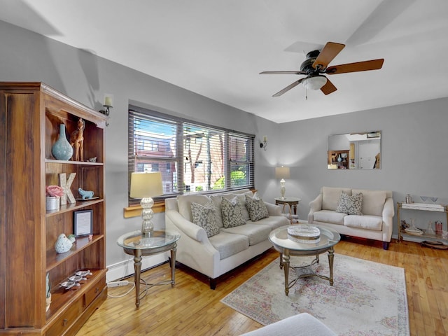 91 Tulip Ave Unit E1, Floral Park, NY 11001 - living room featuring a ceiling fan and wood-type flooring