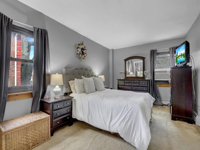 91 Tulip Ave Unit E1, Floral Park, NY 11001 - bedroom with carpet, multiple windows, and cooling unit