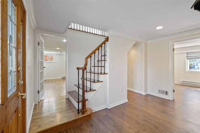 entrance foyer with recessed lighting, stairway, wood finished floors, visible vents, and baseboards