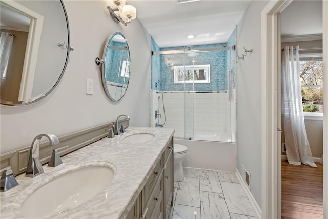 full bath featuring visible vents, a sink, and a healthy amount of sunlight