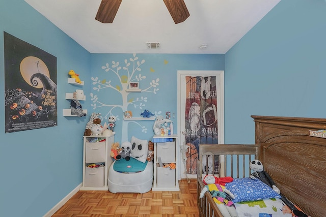 bedroom featuring ceiling fan, baseboards, and visible vents