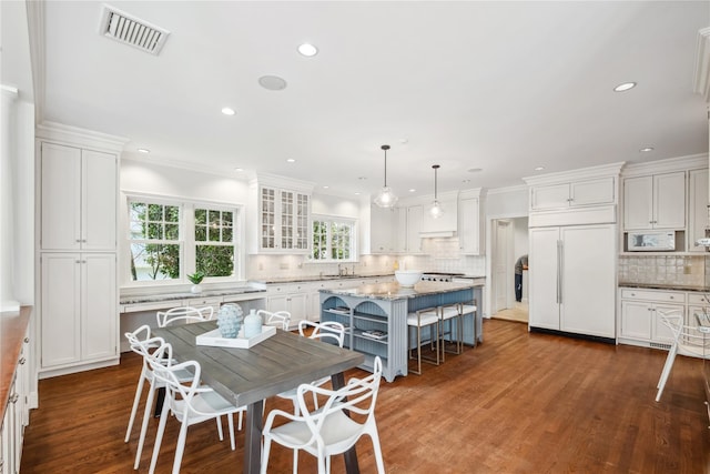 32 Pryer Ln, Larchmont, NY 10538 - dining room with ornamental molding, dark wood-type flooring, recessed lighting, and visible vents