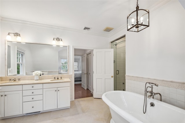 32 Pryer Ln, Larchmont, NY 10538 - ensuite bathroom featuring a sink, a freestanding bath, and ornamental molding
