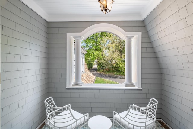 32 Pryer Ln, Larchmont, NY 10538 - unfurnished room with crown molding, ornate columns, and a wealth of natural light