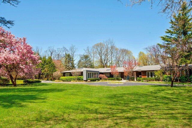 exterior space with aphalt driveway