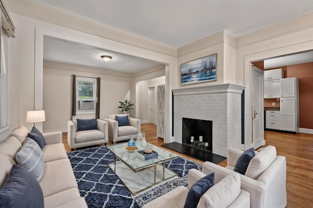 155 Tuckers Corners Rd, Plattekill, NY 12528 - living room with wood finished floors, a fireplace, and cooling unit