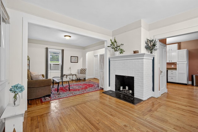 155 Tuckers Corners Rd, Plattekill, NY 12528 - living room featuring a brick fireplace and light wood finished floors