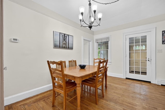 155 Tuckers Corners Rd, Plattekill, NY 12528 - dining area featuring a chandelier and light wood-style flooring