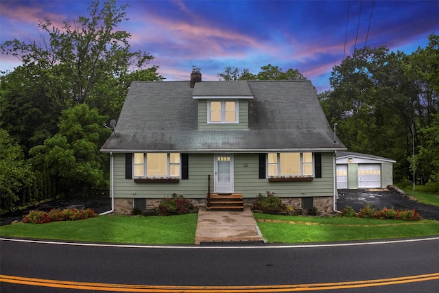 155 Tuckers Corners Rd, Plattekill, NY 12528 - view of front of property featuring an outdoor structure, asphalt driveway, a chimney, and a front yard